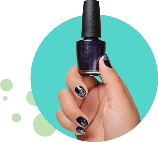 women holding a bottle of navy blue nail polish